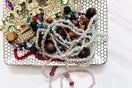 Early Mardi Gras Throws: Glass Bead Necklaces and Handmade Throws
