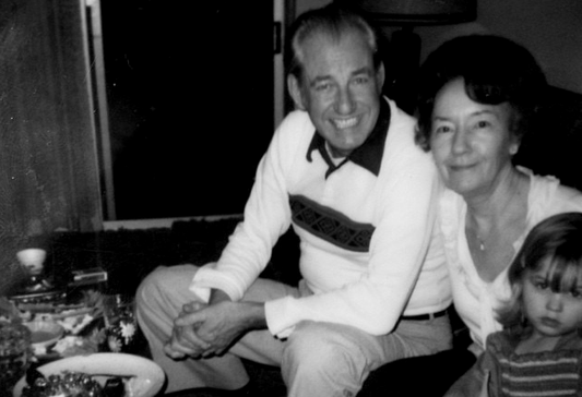 Melanie with her Grandpa and Grandma at Thanksgiving