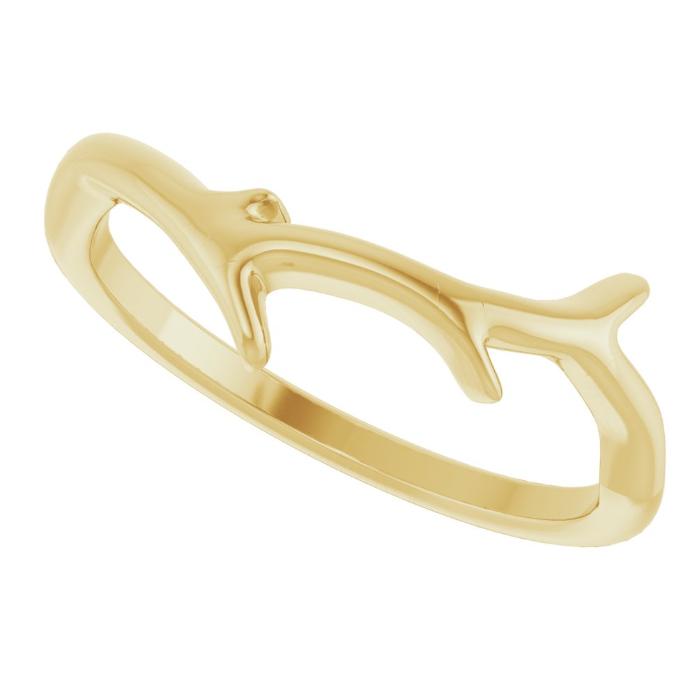 Gold ring designed like a branch on a white background