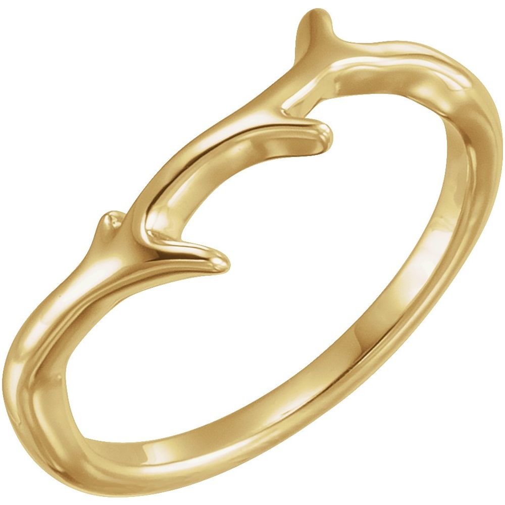 Gold ring with a unique branch design on a white background