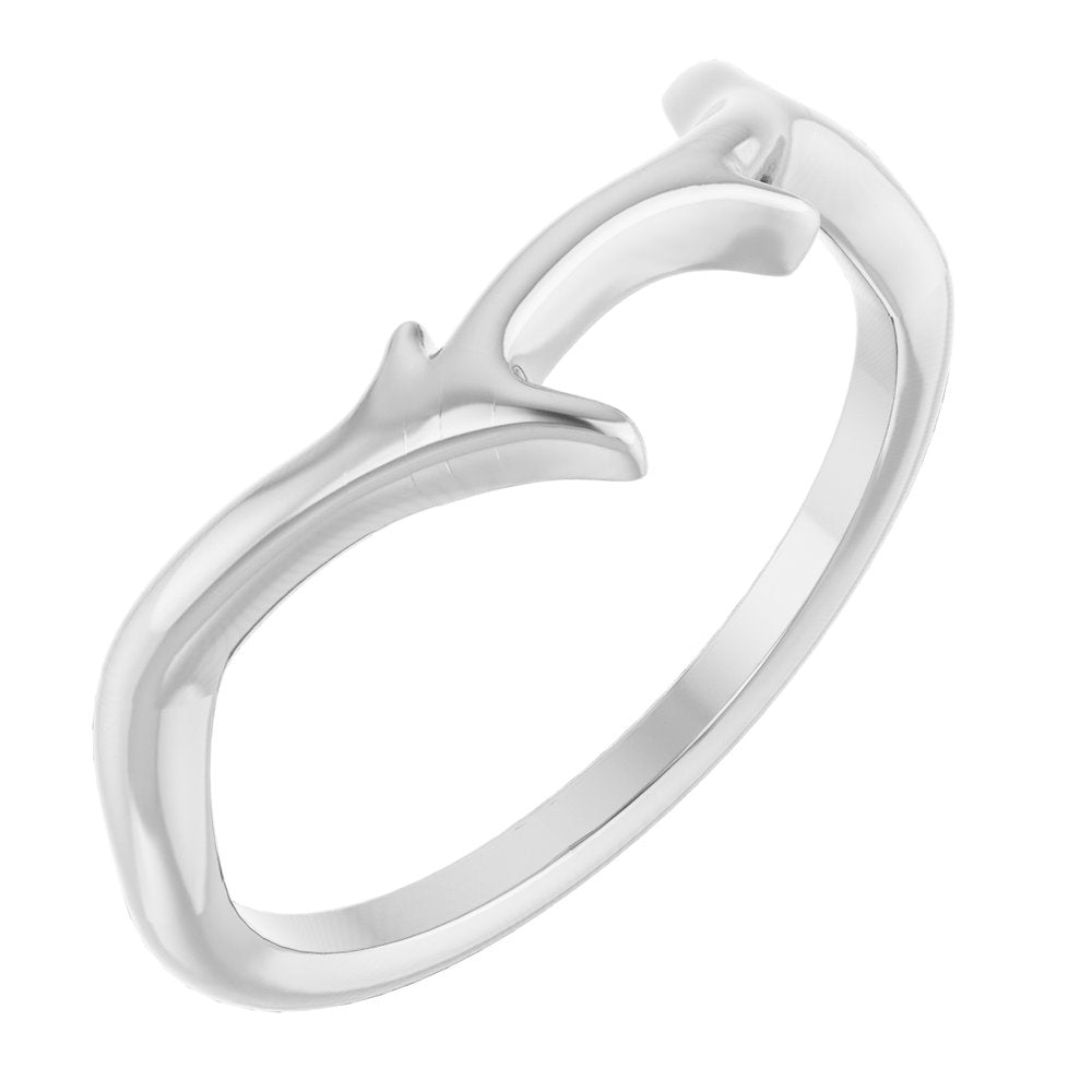 Silver ring with a branch shaped design on a white background