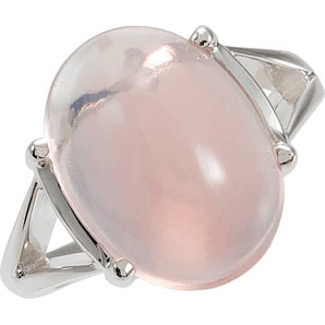 Silver ring with a pink gemstone on a white background
