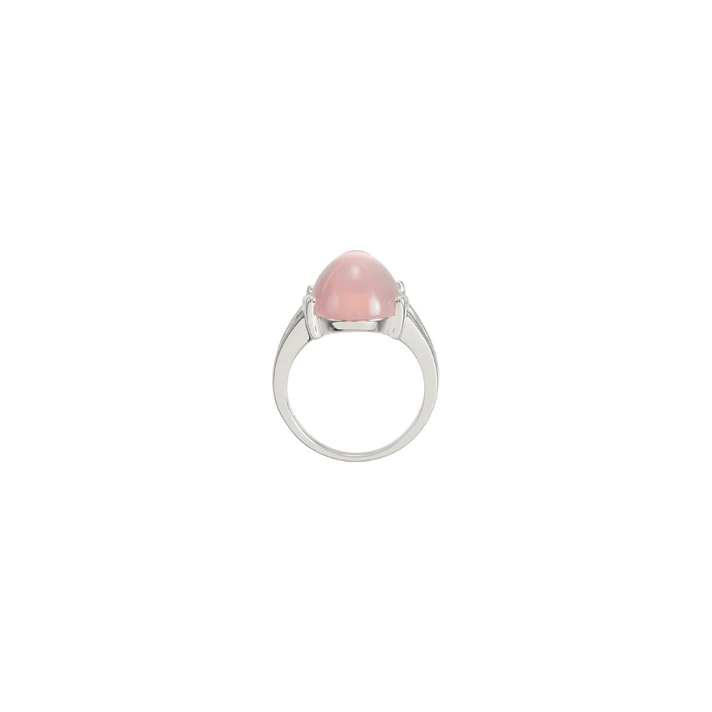 Silver ring with a pink stone on a white background