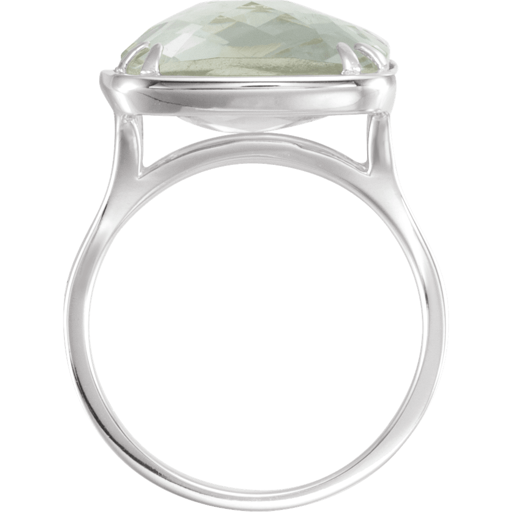 Silver ring with a large green gemstone on a white background