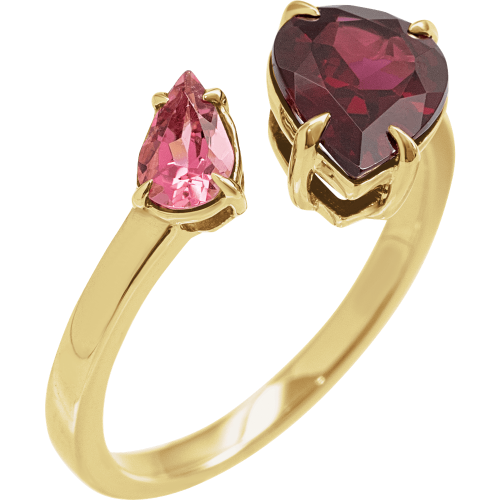 Gold ring with pink and red gemstones on a white background