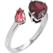 Silver ring with heart-shaped and pear-shaped pink gemstones on a white background