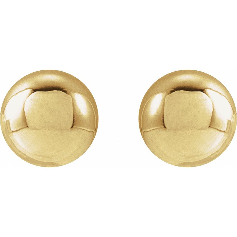Pair of gold round earrings on a white background