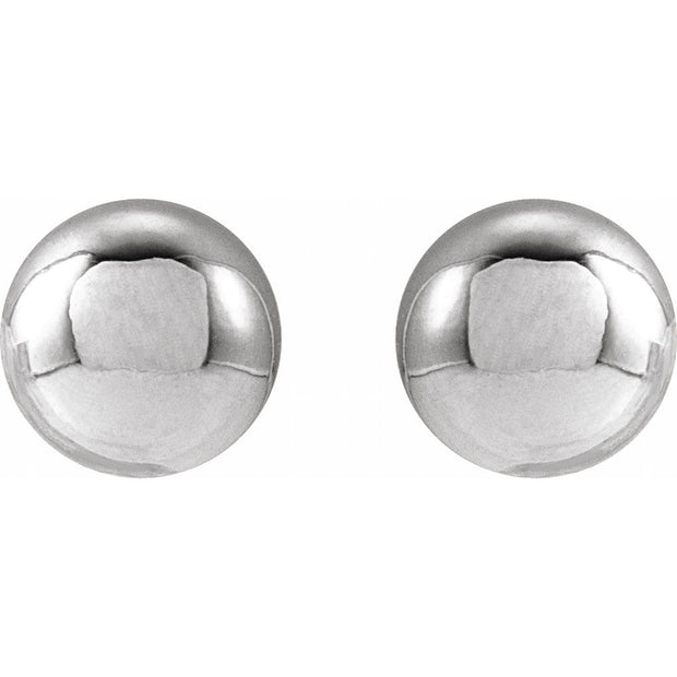 Pair of silver round earrings on a white background