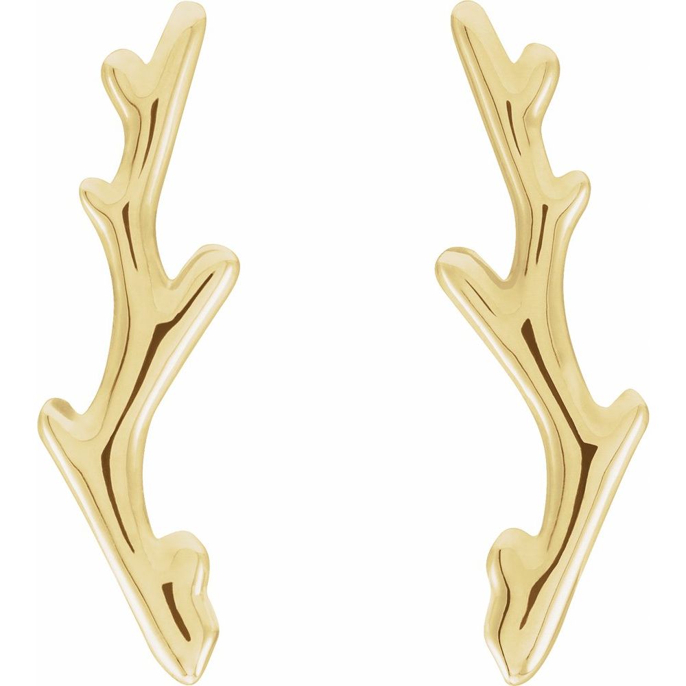 Gold branch-shaped earrings on a white background